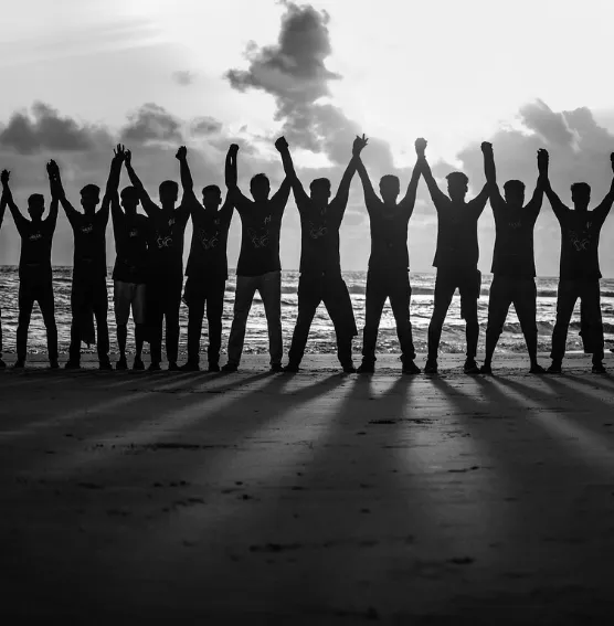 A group of people raising their hands